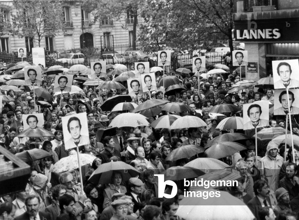 Supporting Demonstration To Jacques Abouchar, Journalist Prisoner in Afghanistan, Organised in Paris By The Committee For his Liberation, here Among Umbrellas Are Seen Some Portraits of Him Carried By The Demonstrators October 18, 1984 (b/w photo)