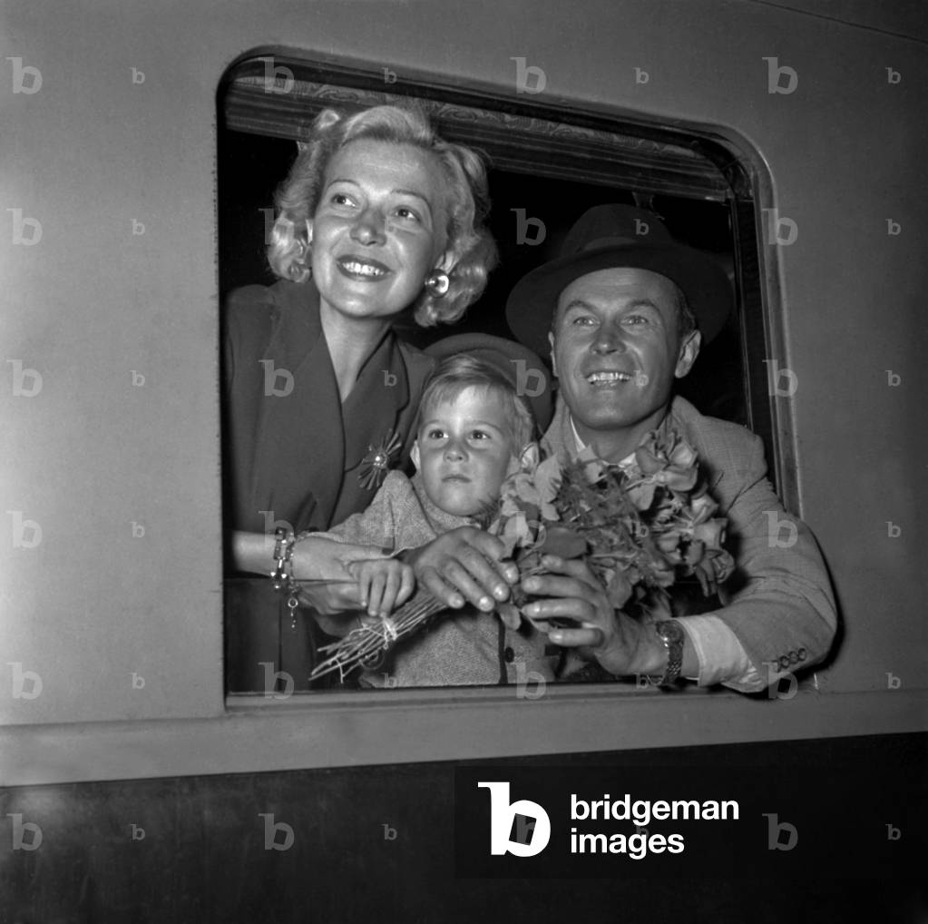 Martha Eggerth and her Husband Jan Kiepura With Their Son, in Train, Arriving in Paris To Make Film 