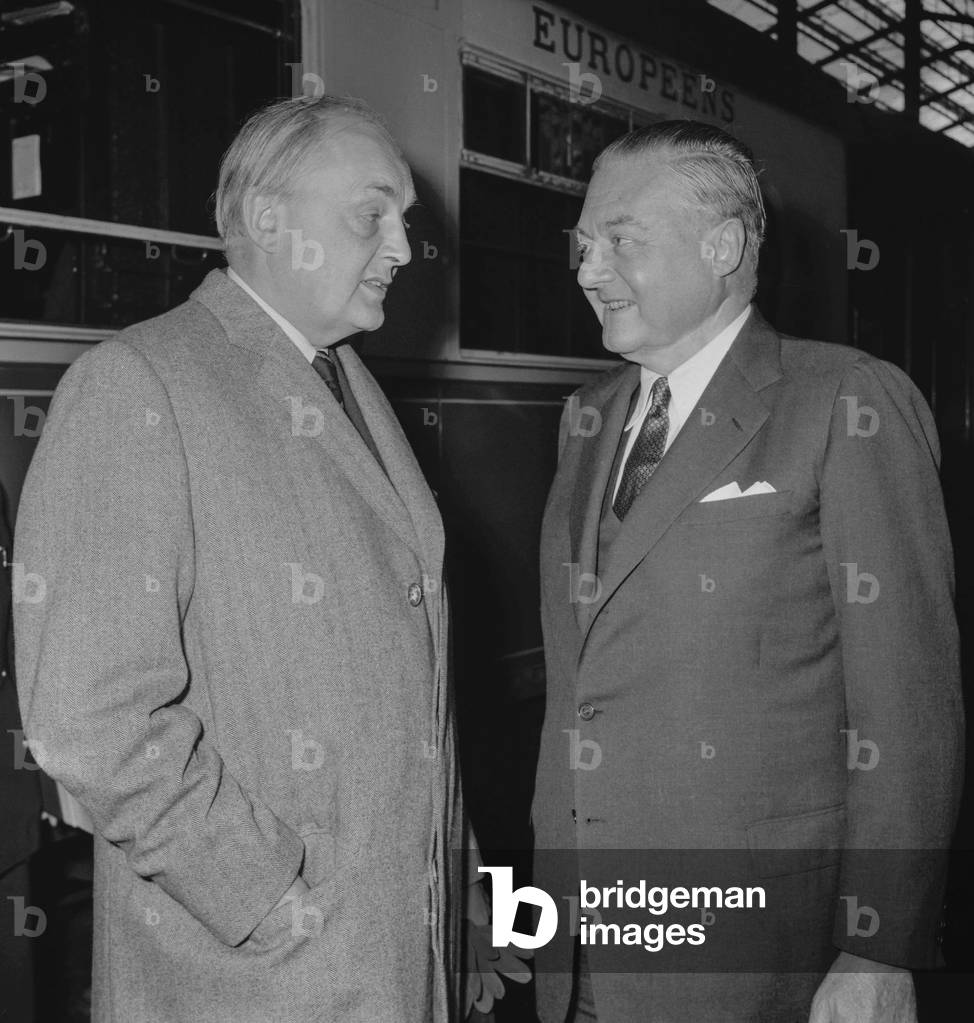 Sir Gladwyn Jebb, former British ambassador in Paris, leaving Paris by train here at the station with American ambassador Amory Houghton, September 20, 1960 (b/w photo)