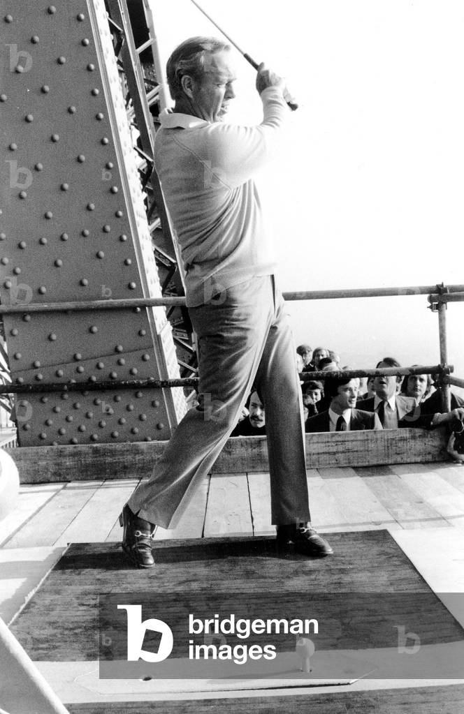 American Golfer Arnold Palmer Throwing The Ball From 2Nd Floor of Eiffel Tower For Opening of 8Th Lancome Golf Trophy October 13, 1977 (b/w photo)