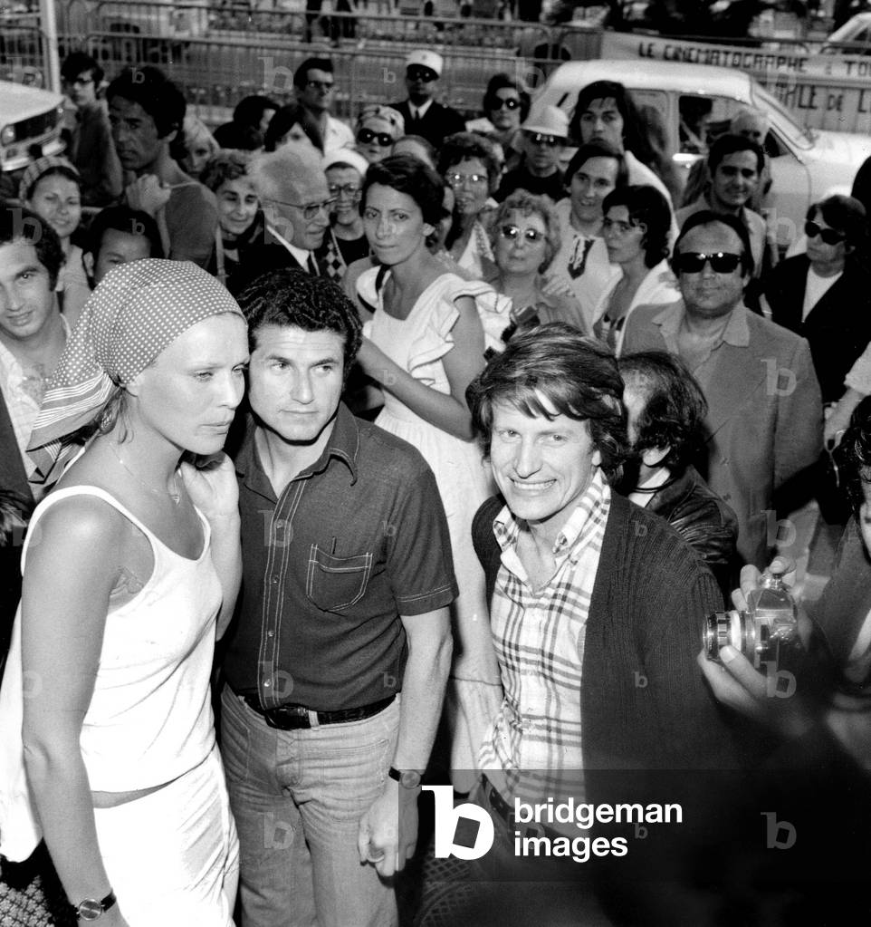 Claude Lelouch With Actors Marthe Keller and Andre Dussolier at Cannes Film Festival For Film and Now My Love May 20, 1974 (b/w photo)
