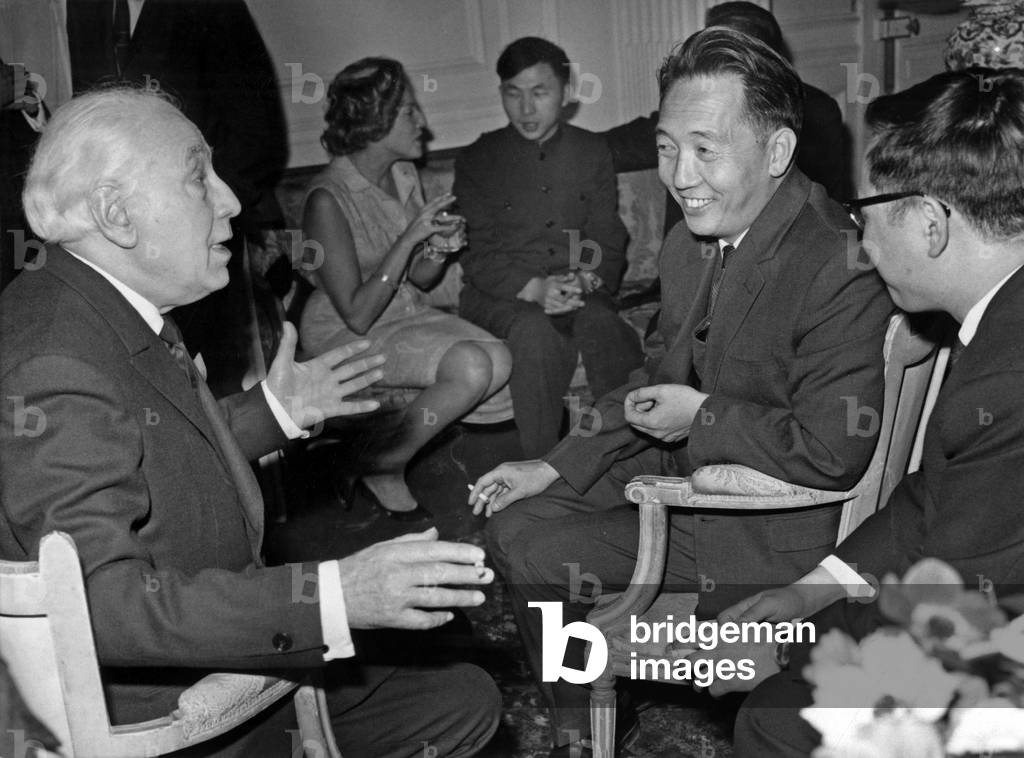 Abel Gance Entering With Mr Sung Chih-Kuang Counsellor Near The Embassy Of The People's Republic Of China In Francelors Of A Cocktail Offered In A Neuilly Building In Honour Of Director Abel Gance On November 13, 1964 (b/w photo)