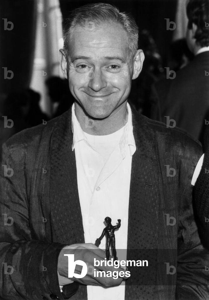Singer and Composer William Sheller After Having received a “Discobole Of Europe” For Disc “Olympia 84” At Quai D'Orsay As part of The Closing Ceremony Of The European Year of Music 18 December 1985 (b/w photo)
