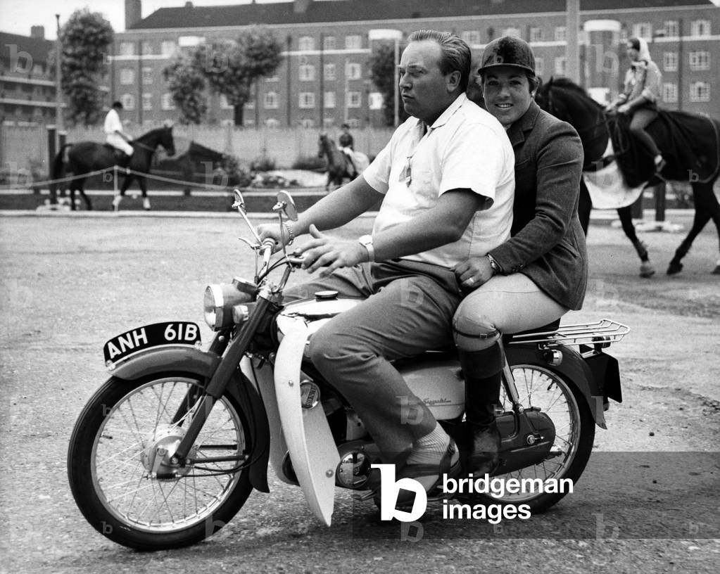 Erik Clarsson, Swedish Rally Champion With His Wife Pat Moss at White City Stadium for the Opening of “International Horse Show” July 20, 1964. (b/w photo)