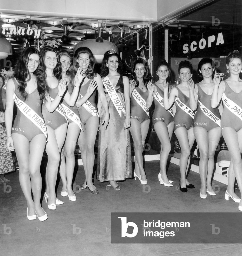The Finalist Candidates To The Miss France 1971 Beauty Contest : M. Mauger, D. Martinet, G. Bochard, M. Stocco Future Miss France 1971 , Micheline Beaurain Former Miss France 1970, D. Lapouge, N. Doyer, F. Carnovali, D. Laboureau, and N. Lorcery December 21, 1970 (b/w photo)