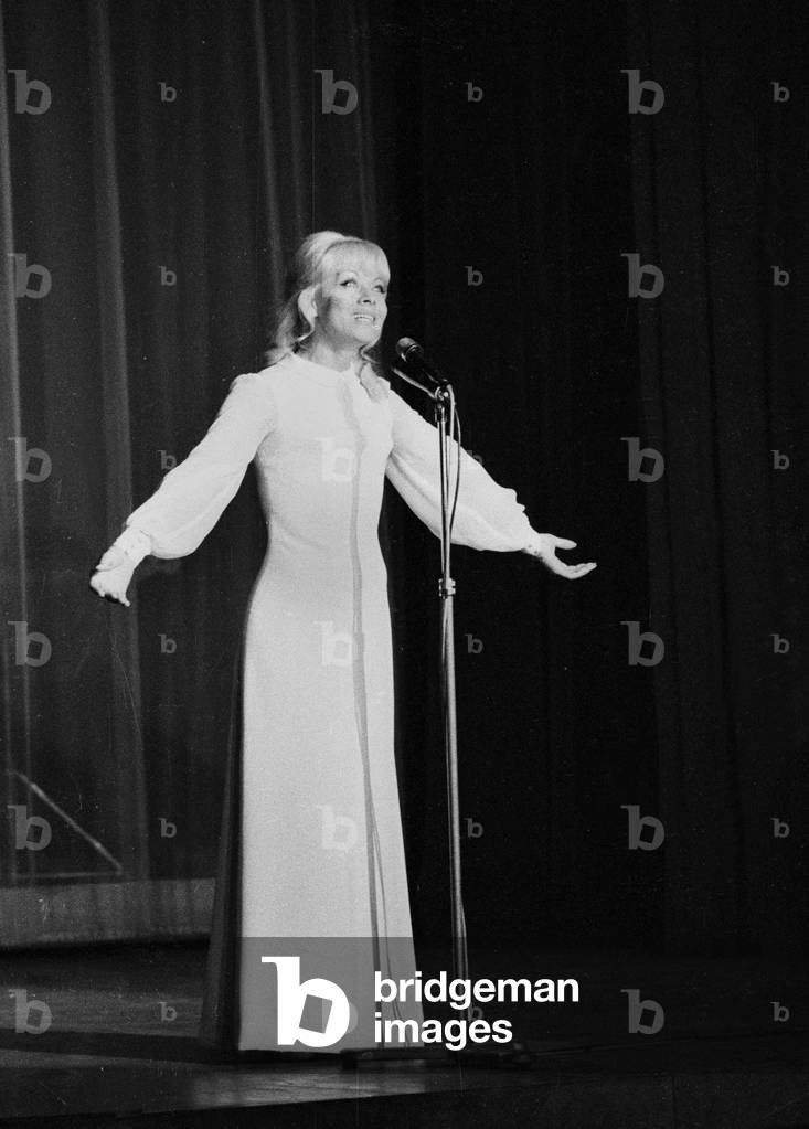 French Singer Isabelle Aubret on Stage at Bobino, Paris, May 3, 1968 (b/w photo)