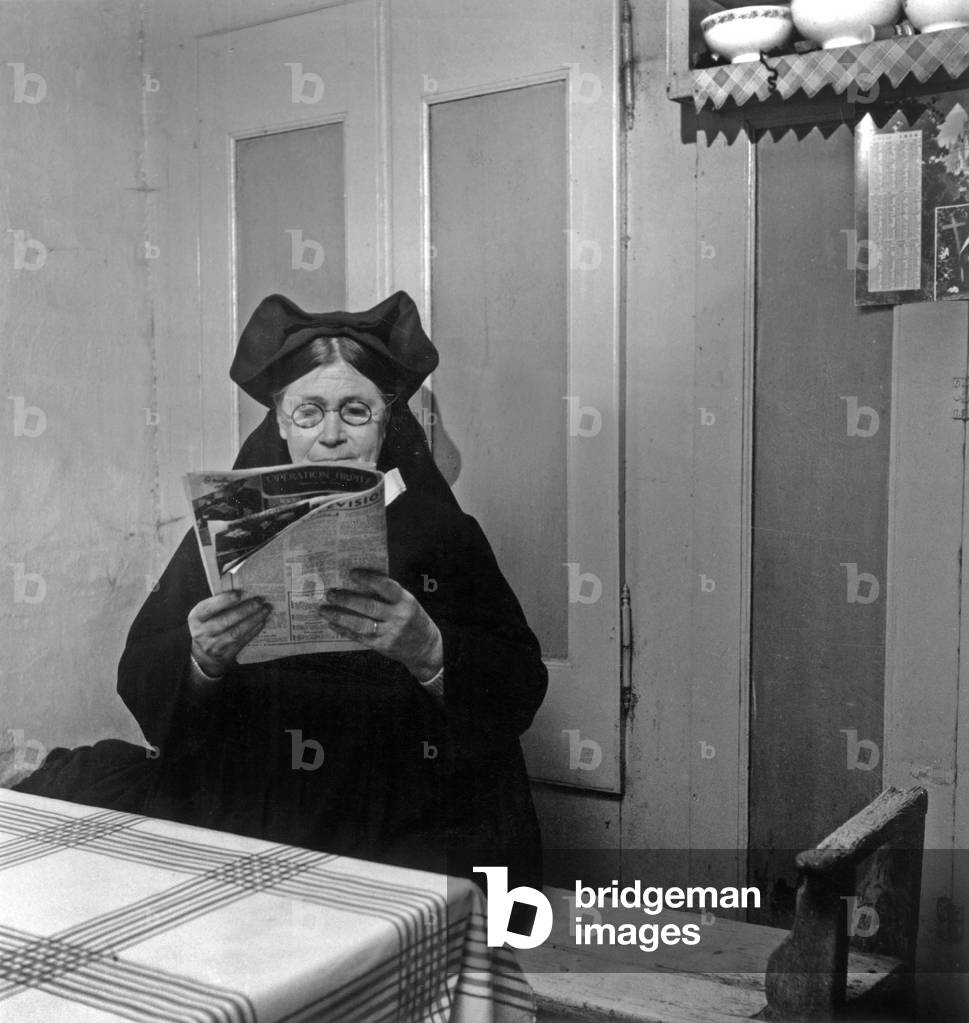 Breton In Traditional Habit Reading A Popular Review C.1955 (b/w photo)