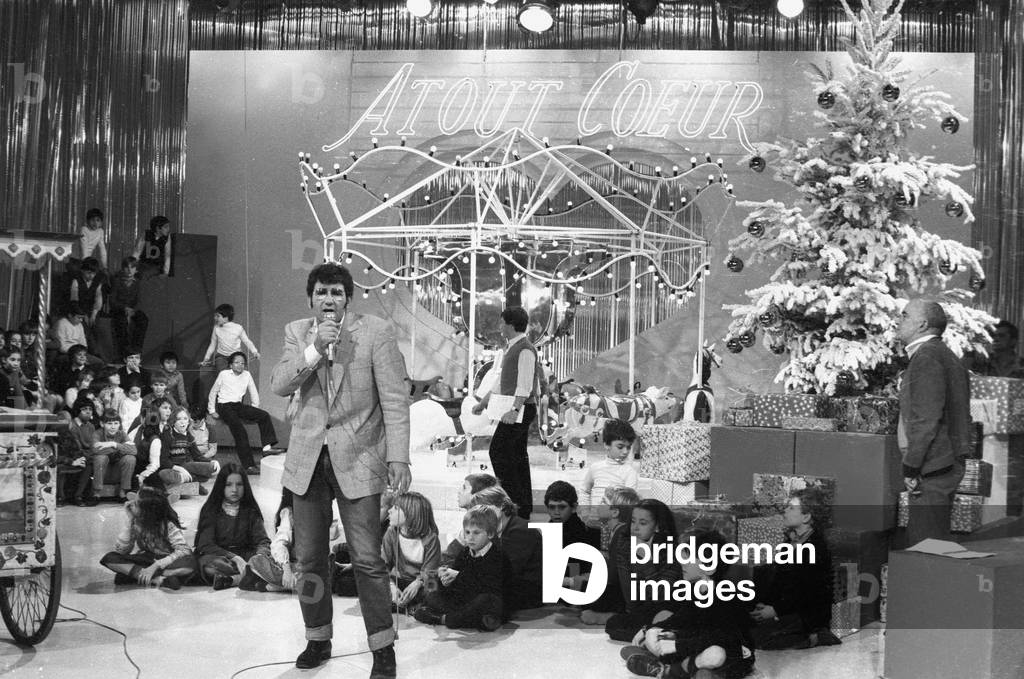 Richard Gotainer (Born In Paris March 30, 1948) Is a French singer-comedian Here In The Tv Show “Atout Coeur” December 21, 1982 (b/w photo)