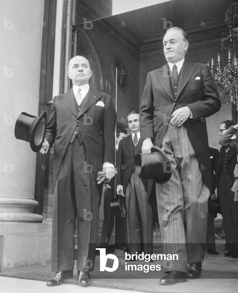 Manuel Aguirre de Carcer, Spanish ambassador in Paris, and Jacques Dumaine, head of the protocol, leaving Elysee after meeting with French president, Paris, March 8, 1951 (b/w photo)