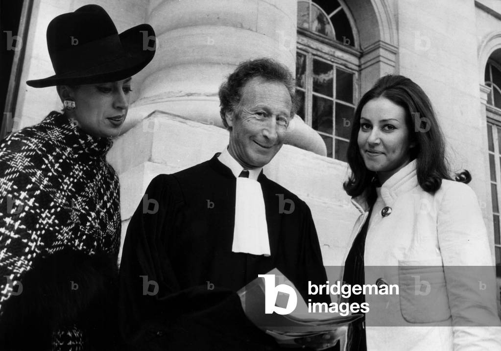 At the Palais De Justice de Paris, Mrs. Genevieve De Fontenay (Secretary General of the Committee Miss France In the Company of Her Lawyer Maitre Weil Curiel And Micheline Beaurain (Miss France 1970) To claim the Rights of the Title Of Miss France December 16, 1970 (b/w photo)