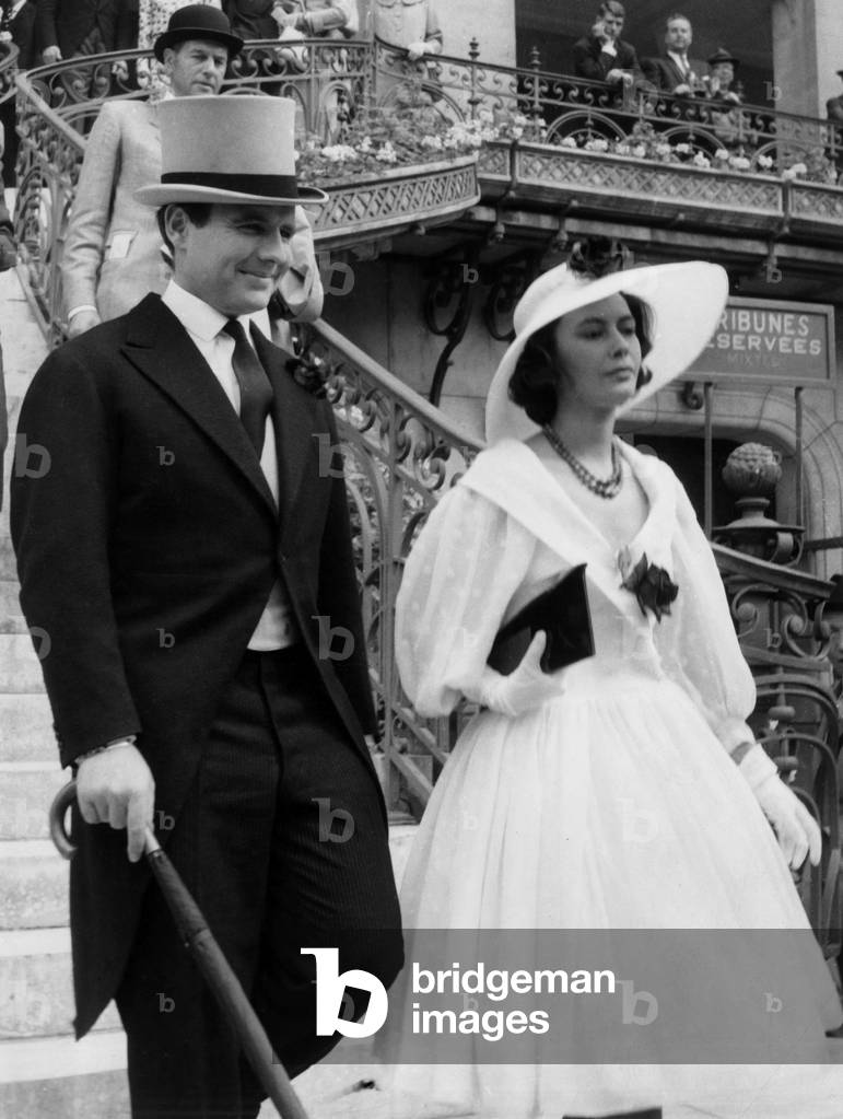Prince Sadruddin Aga Khan and Nina Dyer at Longchamp Racetrack, Paris, 1957 (b/w photo)
