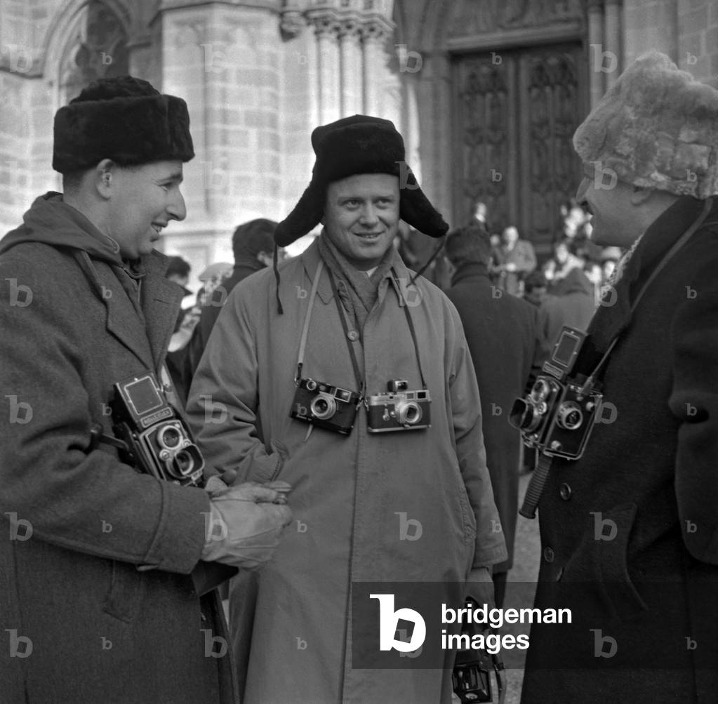Photographers Kovarski, Pierre Boulat and Raymond Darolles in Dreux, January 1957 (wedding of Helene de France) (b/w photo)