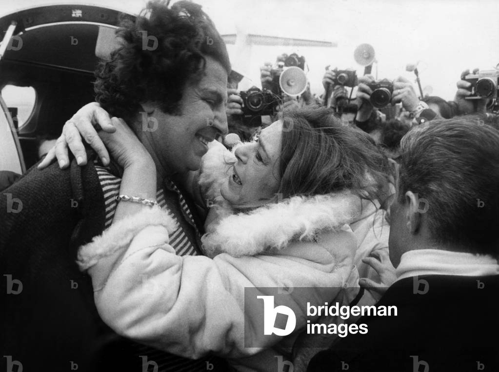 In Paris, Melina Mercouri Welcoming Mikis Theodorakis Arriving From Greece Where He Was Interned in A Camp, April 14, 1970 (b/w photo)