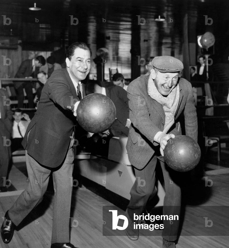Actors Paul Meurisse and Bourvil Bowling April 6, 1965 (b/w photo)