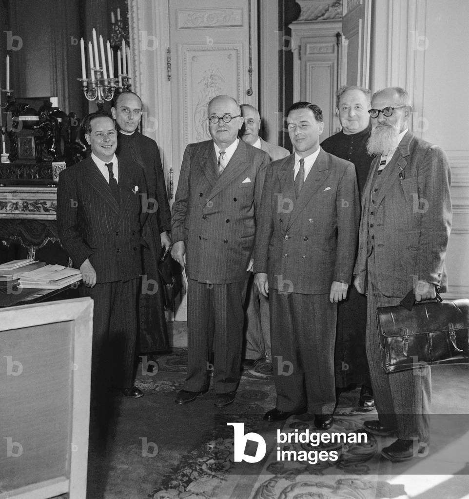 Deportees from the Yonne are received at the Elysee, paris, June 1950 : RP Riquet (l) and French president Vincent Auriol (b/w photo)