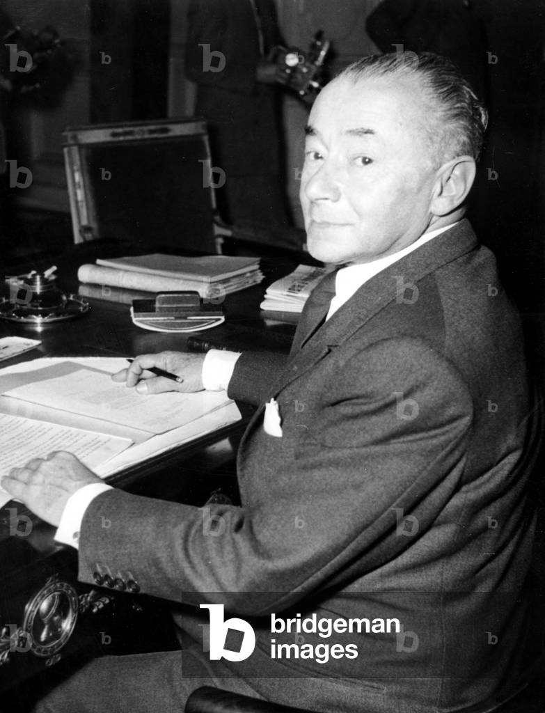 Paul Reynaud at his Desk After Transmission of Powers For The Post of Minister of Finances July 27, 1948 (b/w photo)