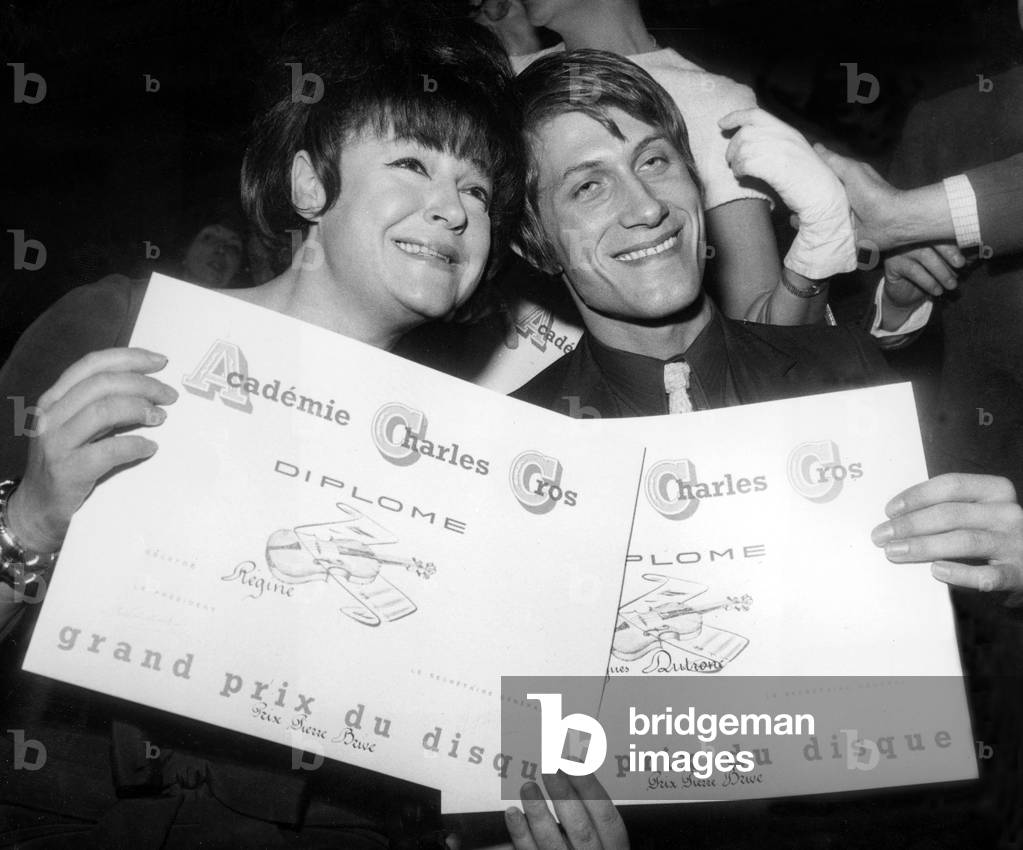 French Singers Regine and Jacques Dutronc Receiving A Prize March 9, 1967 (b/w photo)