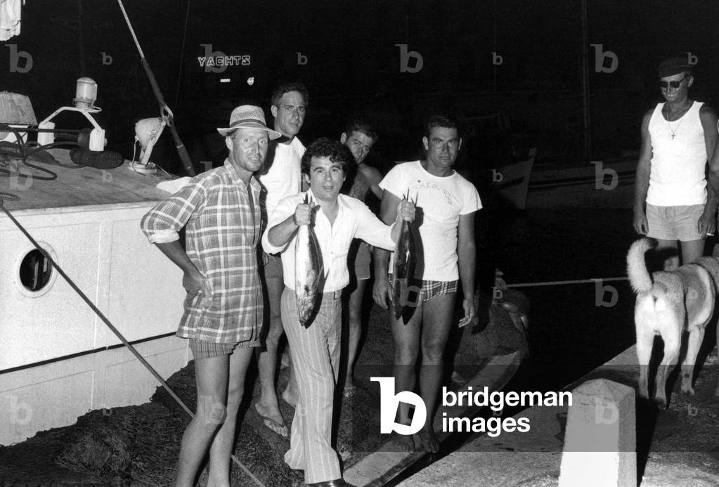 French Singer Claude Nougaro Back From A Night of Fishing on Tuna Boat August 1, 1969 (b/w photo)