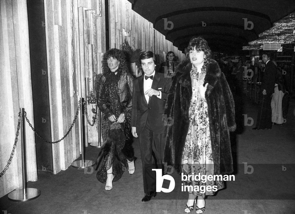 French singer Dani (Daniele Graule, l) and Thierry Le Luron at ShirleyMacLaine party at the Lido, Paris, April 24, 1979 (b/w photo)