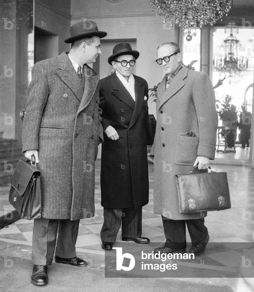 French politicians Gaston Deferre, Paul Giacobbi and Guy Mollet leaving Elysee, Paris, after Council of Ministers, February 7, 1951 (b/w photo)