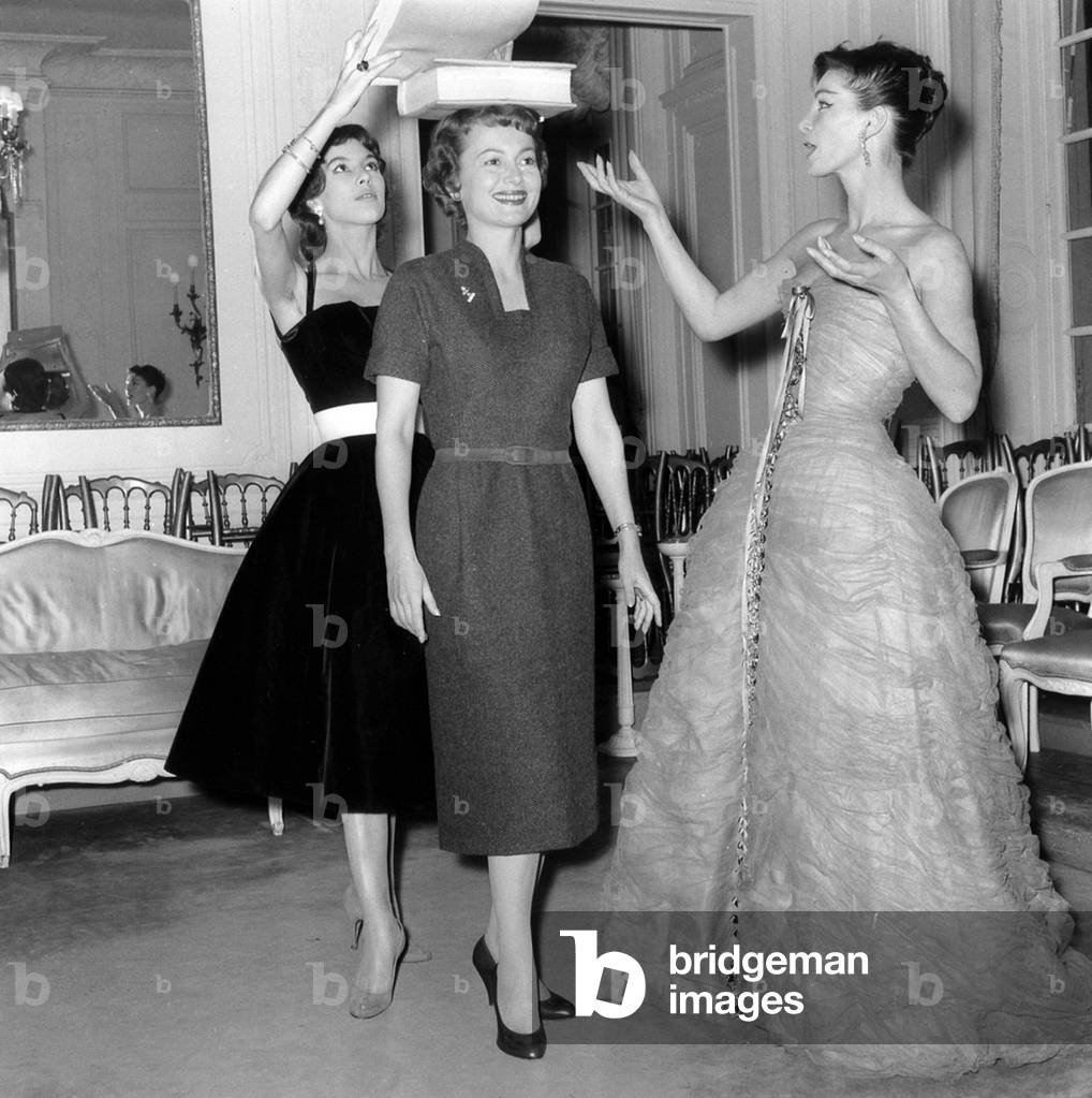 In Dior Room Olivia De Havilland Is Learning To Be A Model With Victoire and Lucie Daouphars, Called Lucky, October 28, 1955 Because She Is Shooting in Paris A Movie (b/w photo)