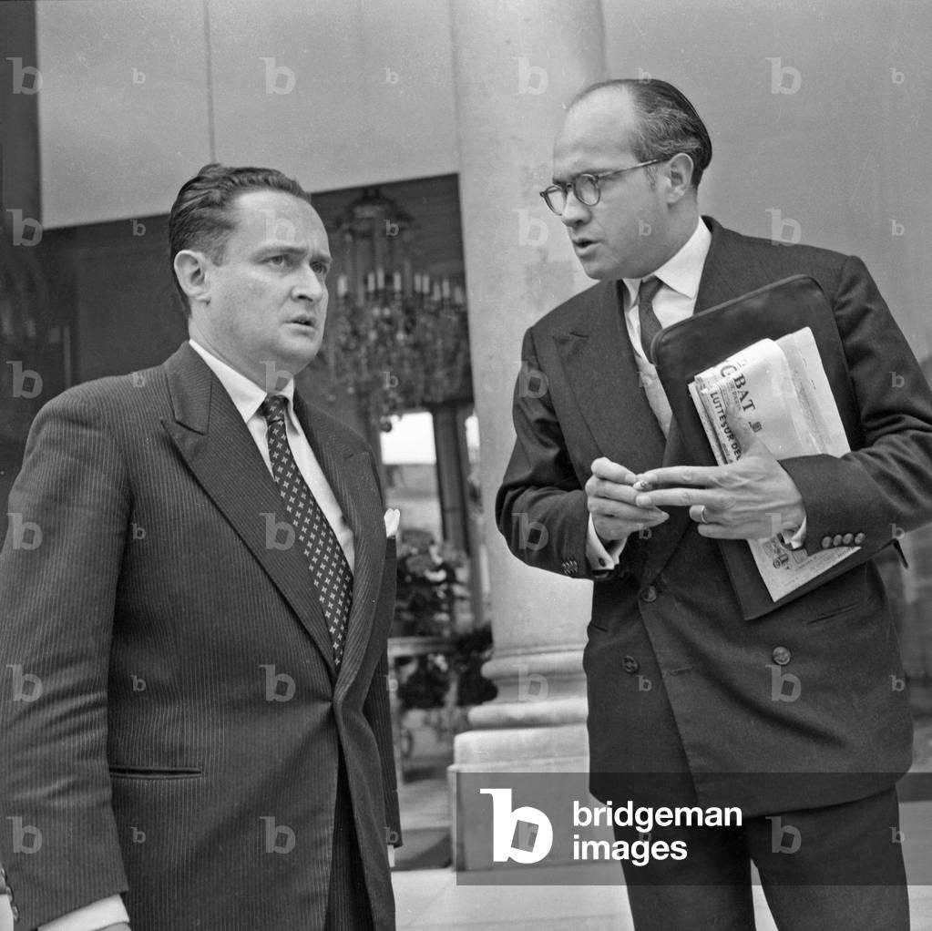 Mr Bourges Maunoury Minister of National Defense and Mr Alain Savary (Right) Secretary of State for Moroccan and Tunisian Affairs leaving the Palais De L'Elysee After the Council of Ministers 4 July 1956 (b/w photo)