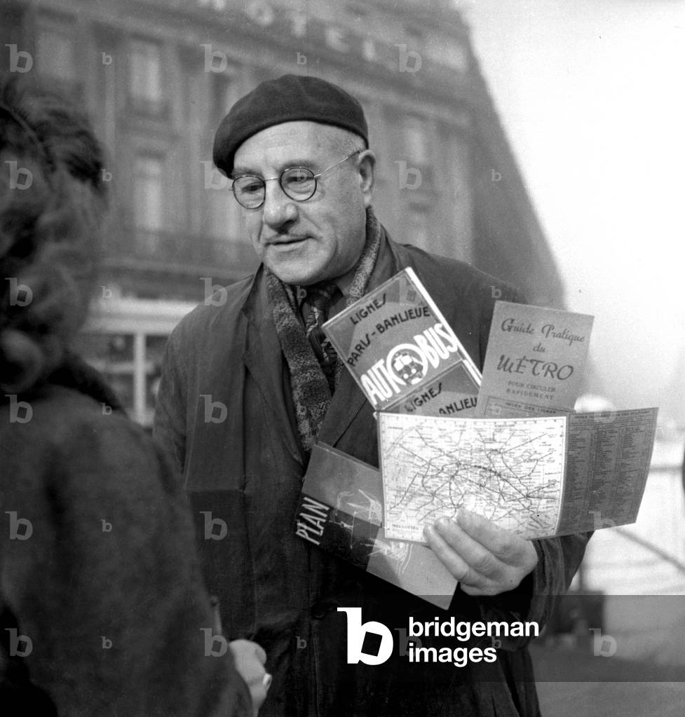 Man Selling Metro Maps, Paris, November 5, 1946 (b/w photo)