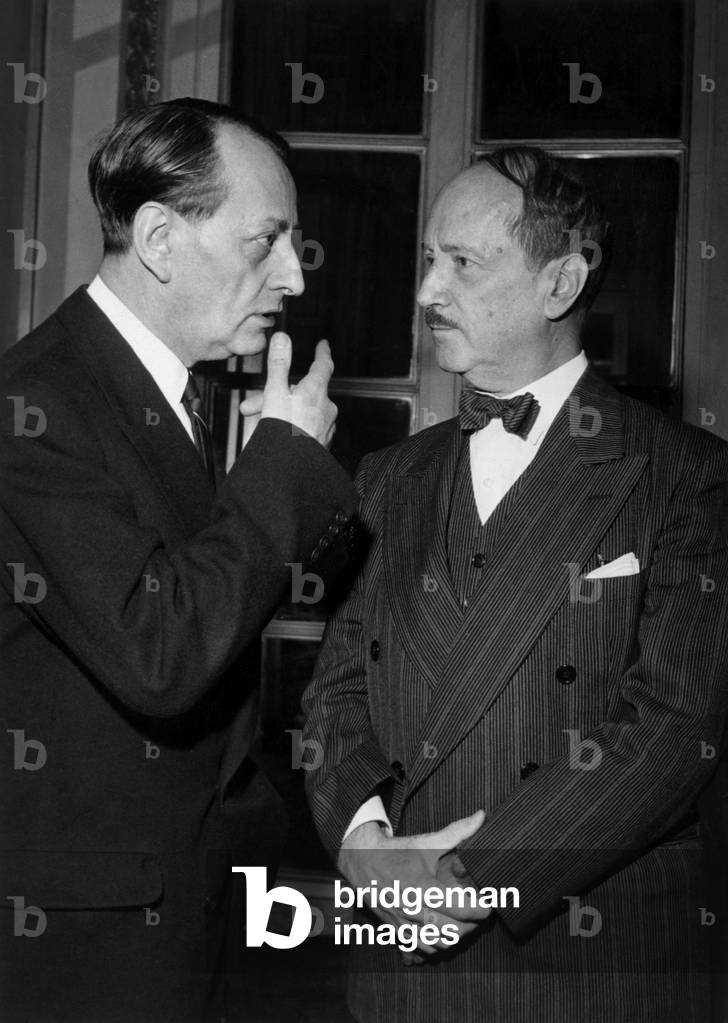 Andre Malraux (1901-1976) French Minister of Culture and Saint-John Perse (1887-1975) French Poet here during Giving of A Prize in Paris on November 10, 1959 (b/w photo)
