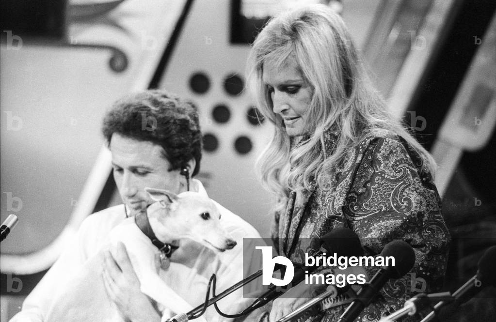 French presenter Michel Druker with his dog Zaza and French singer Dalida on 'Studio 1' radio programme in Paris, on October 8, 1985