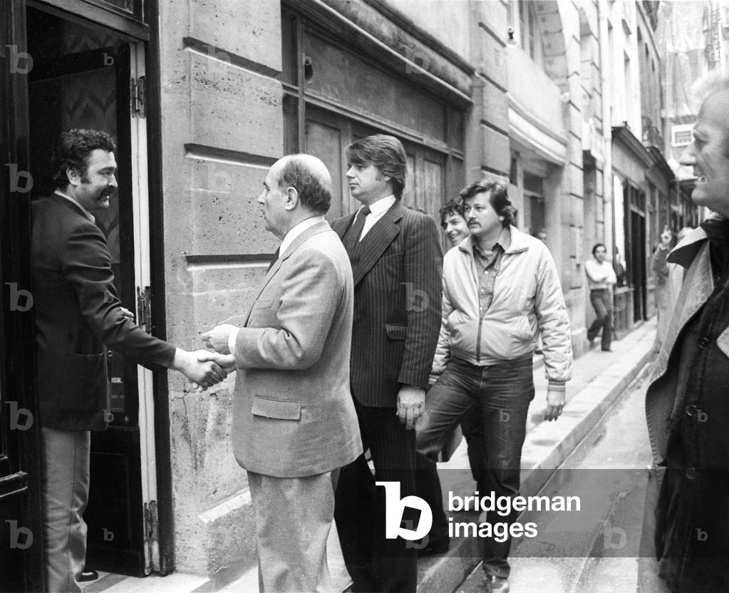 Francois Mitterrand, New French President, Shaking Hand With Residents of The Rue De Bievre in Paris, He'S With his Bodyguard Andre Tourlier on May 12, 1981 (b/w photo)