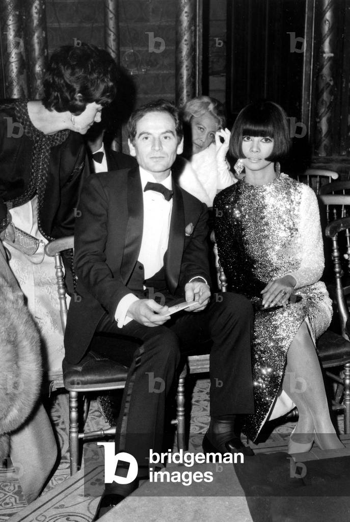 The French Couturier Pierre Cardin and Top Model Hiroko Matsumoto With The Duchess of La Rochefoucauld at The Sainte Chapelle in Paris on September 29, 1965 (b/w photo)