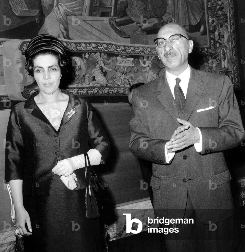King of Afghanistan Mohamed Zaher Shah and his Wife Queen Homaira in Paris, June 3, 1965 (b/w photo)