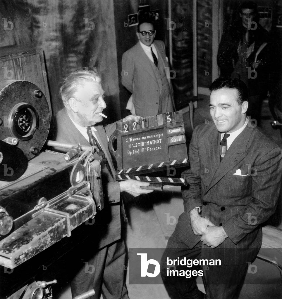 Marcel Cerdan and Director Leon Mathot on Set of Film L'Homme Aux Mains D'Argile June 12, 1949 (b/w photo)