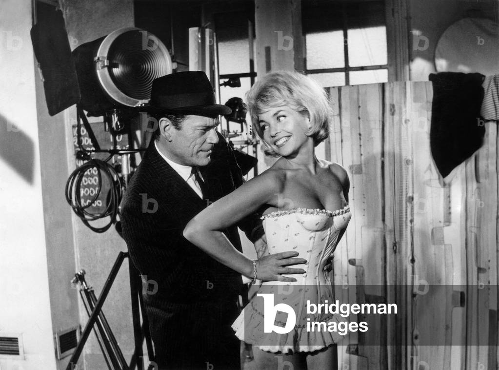 Patricia Viterbo And Eddie Constantine On The Shooting Of Guylefranc's “Let Shoot The Shoots” On November 5, 1963 (b/w photo)