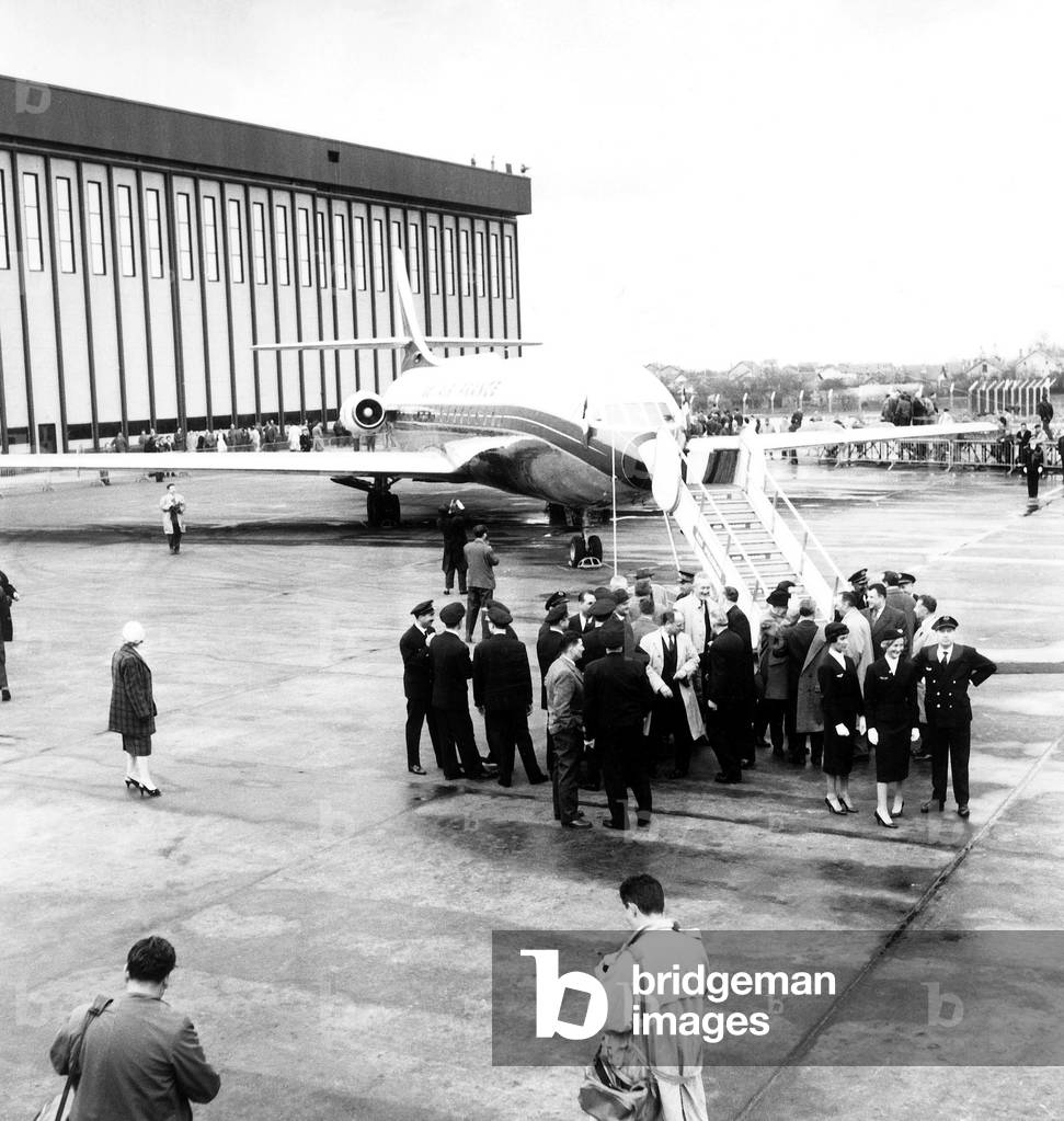 Naming Ceremony For The Caravels of Air France at Orly Airport March 24, 1959 : Yvonne De Gaulle Ceremonially Launches The Plane Lorraine With Champagne (b/w photo)
