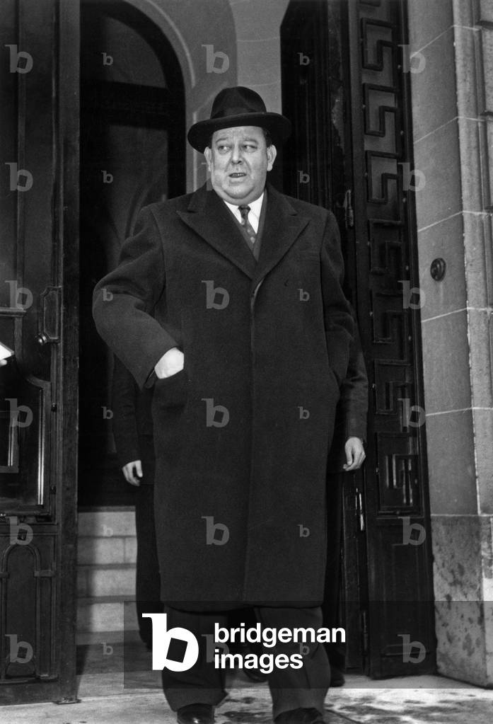Mr Trygve Lie Secretary General of the United Nations leaving the Embassy of India in Paris After an interview with the Ambassador on January 18, 1951 (b/w photo)