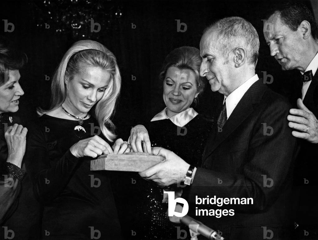Louis De Funes Giving To Marie Claude Beaumont The Boldness Prize : She Was The First Woman To Participate To Le Mans Car Race December 3, 1971 (b/w photo)
