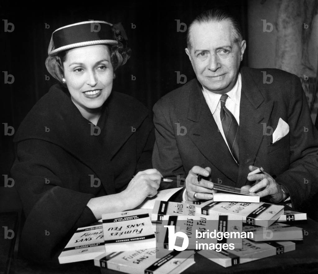 Germaine and Jacques Decrest Get An Award For The Novel 'Fumees Sans Feu', April 5, 1951 (b/w photo)