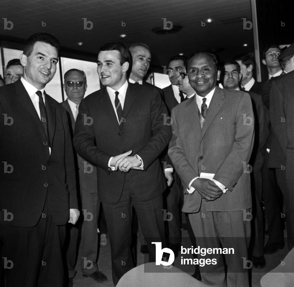 Jean Charbonnel, Departure For Madagascar With Serge Herve and Albert Rakoto Ratsimamanga, February 1St, 1966 (b/w photo)