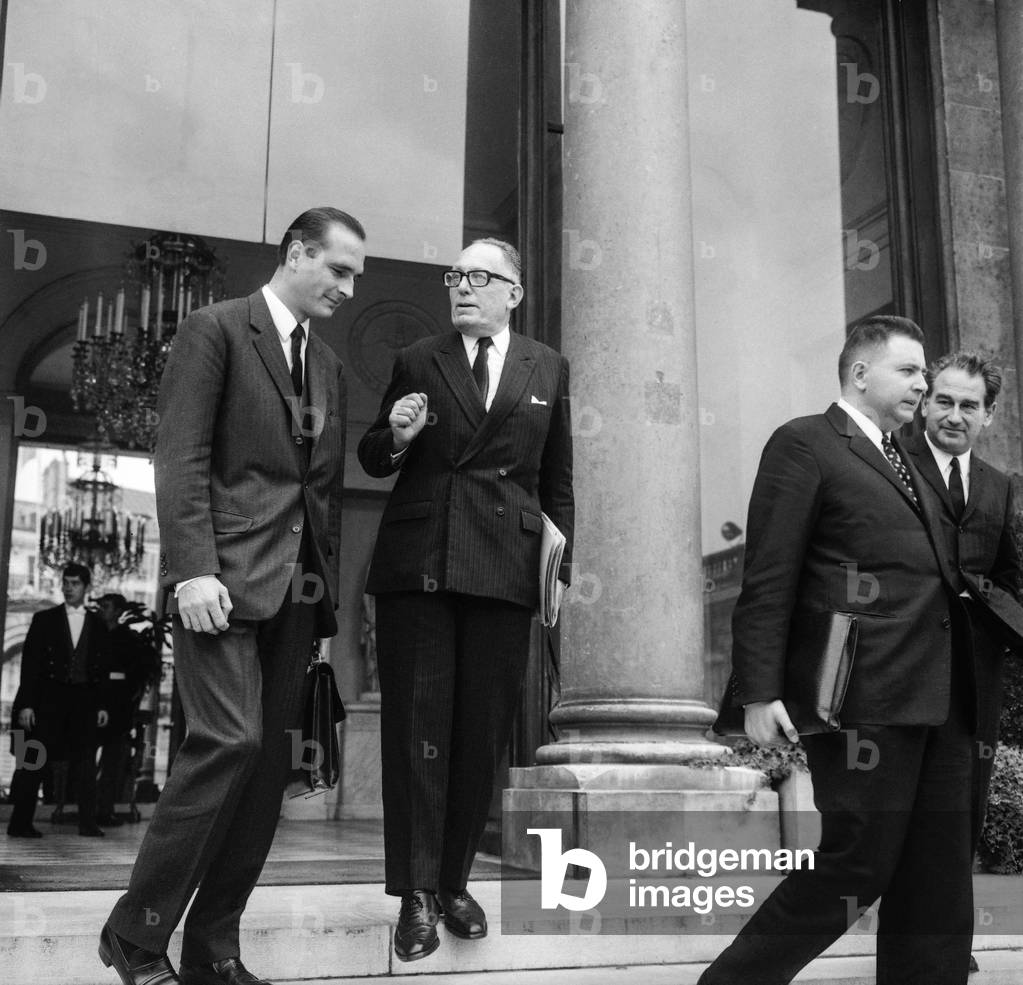 Jacques Chirac, Maurice Schumann, Jacques Trorial and Joseph Comiti leaving the Elysee after council of ministers, Paris, October 2, 1968 (b/w photo)