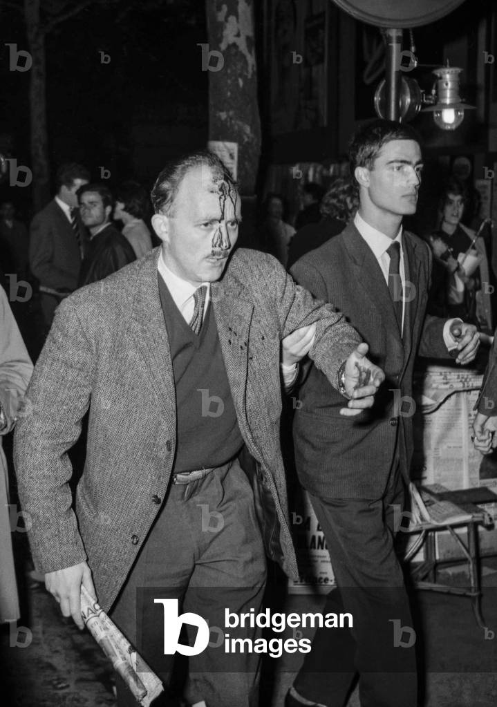 Demonstration for peace in Algeria (at time of Algerian War), Paris, October 27, 1960, the demonstration is suppressed by the police : here a wounded man (b/w photo)