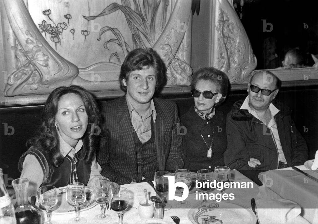 Patricia Coquatrix, Patrick Sebastien, Paulette Coquatrix and Jean Michel Boris (Director of The Olympia, Paris) December 20, 1979 at Maxim'S Restaurant in Paris (b/w photo)