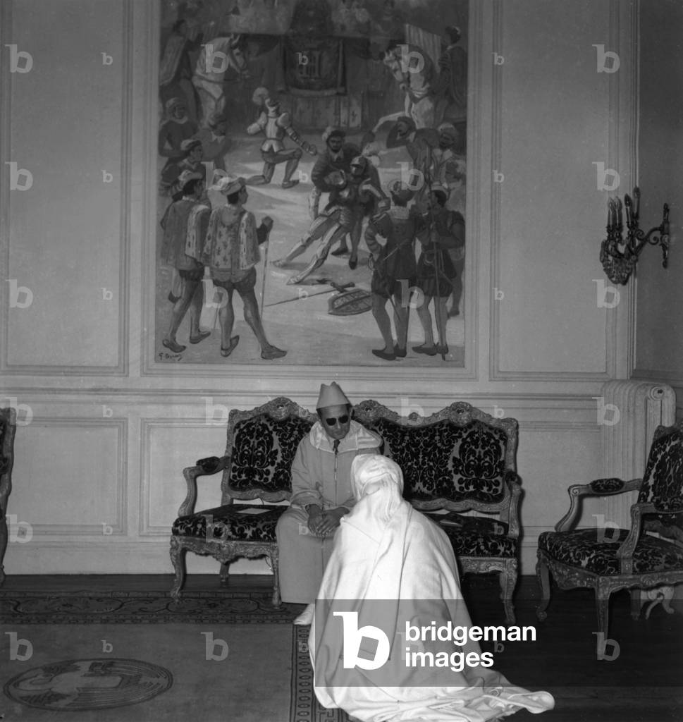 Morocco Sultan Mohamed Ben Youssef (Mohamed V) Forgiving To Thami El Glaoui (Marrakech Pacha) Kneeling in Front of Him (He Was One of The Authors of The Deposition of Sultan En 1953) on November 8, 1955 in Saint Germain En Laye (France) (b/w photo)