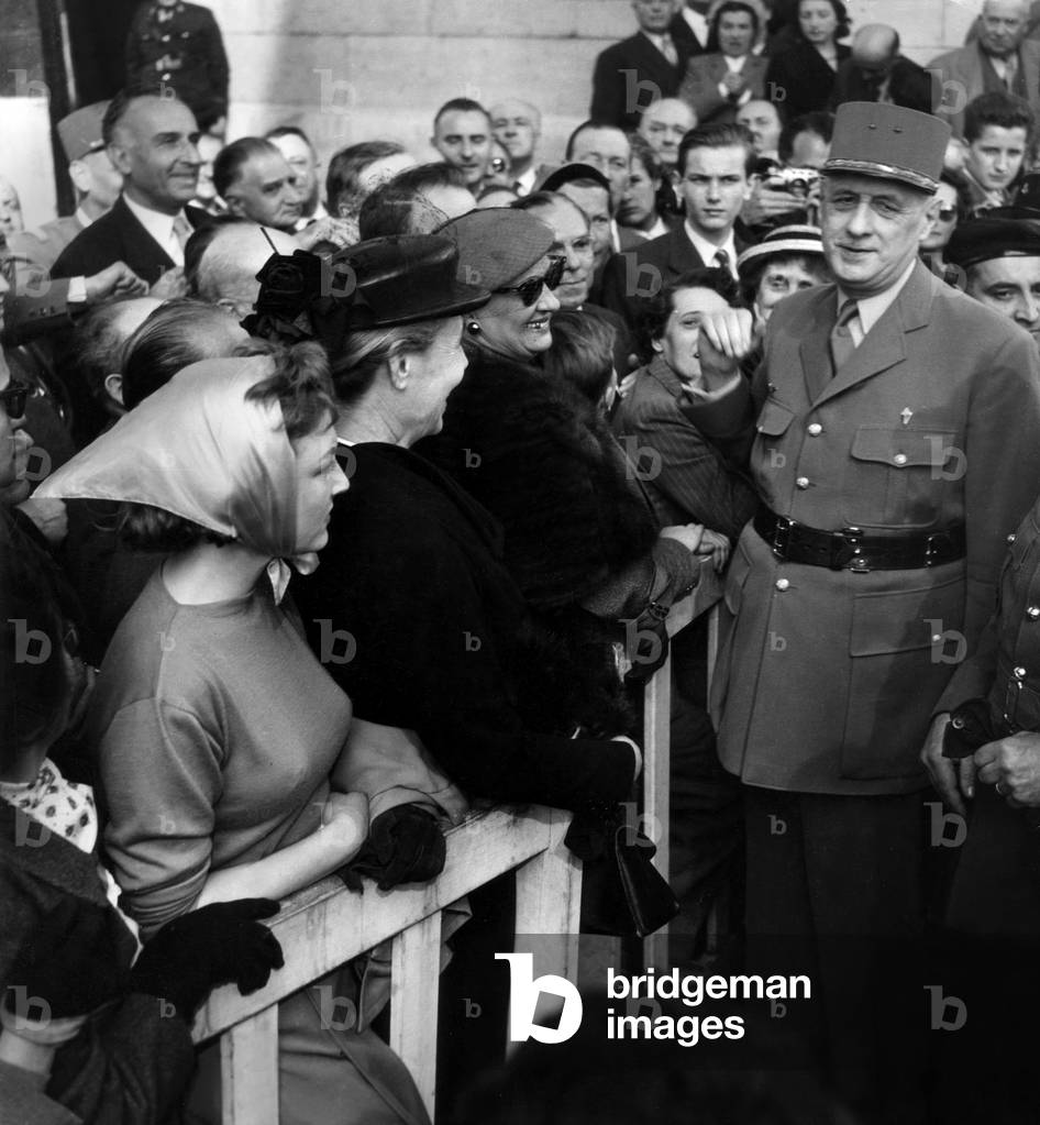 Anniversary of The Victory on May 9, 1954 : General Charles De Gaulle, in The Foreground The Actress Nicole Courcel (b/w photo)
