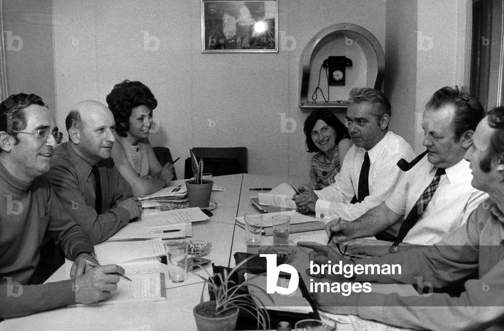 The Leaders of Two Trade-Union Power, Cgt and Cfdt, Left, From Left To Right: Rene Buhl, Henri Krasucki (1924-2003), Jacqueline Dhervilly (Cgt) and Right, Left To Right: Martine Guillaume, Laurent Lucas (President of The Cfdt), Rene Bonnet and Fred Krumnov Are Assembled in The Head Office of The Cgt For Discuss About The Social Condition of Renault, May 6, 1971 (b/w photo)