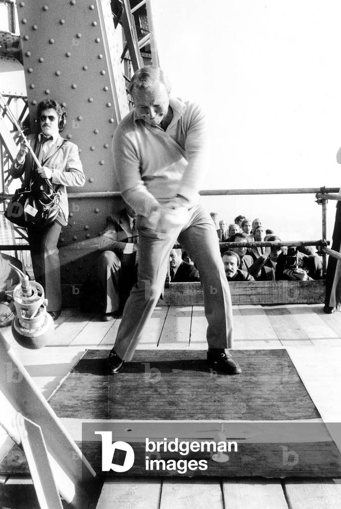 American Golfer Arnold Palmer Throwing The Ball From 2Nd Floor of Eiffel Tower For Opening of 8Th Lancome Golf Trophy October 13, 1977 (b/w photo)