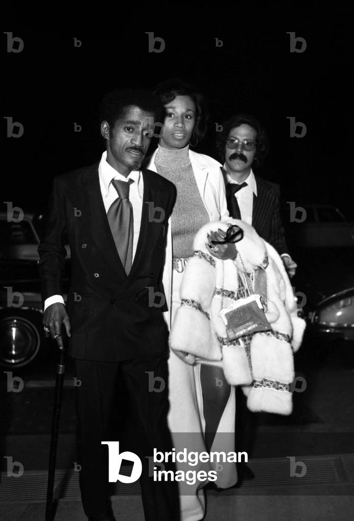 Sammy Davis Jr and his wife Altovise arriving at Maxim's Restaurant for the recording of the TV Programme 