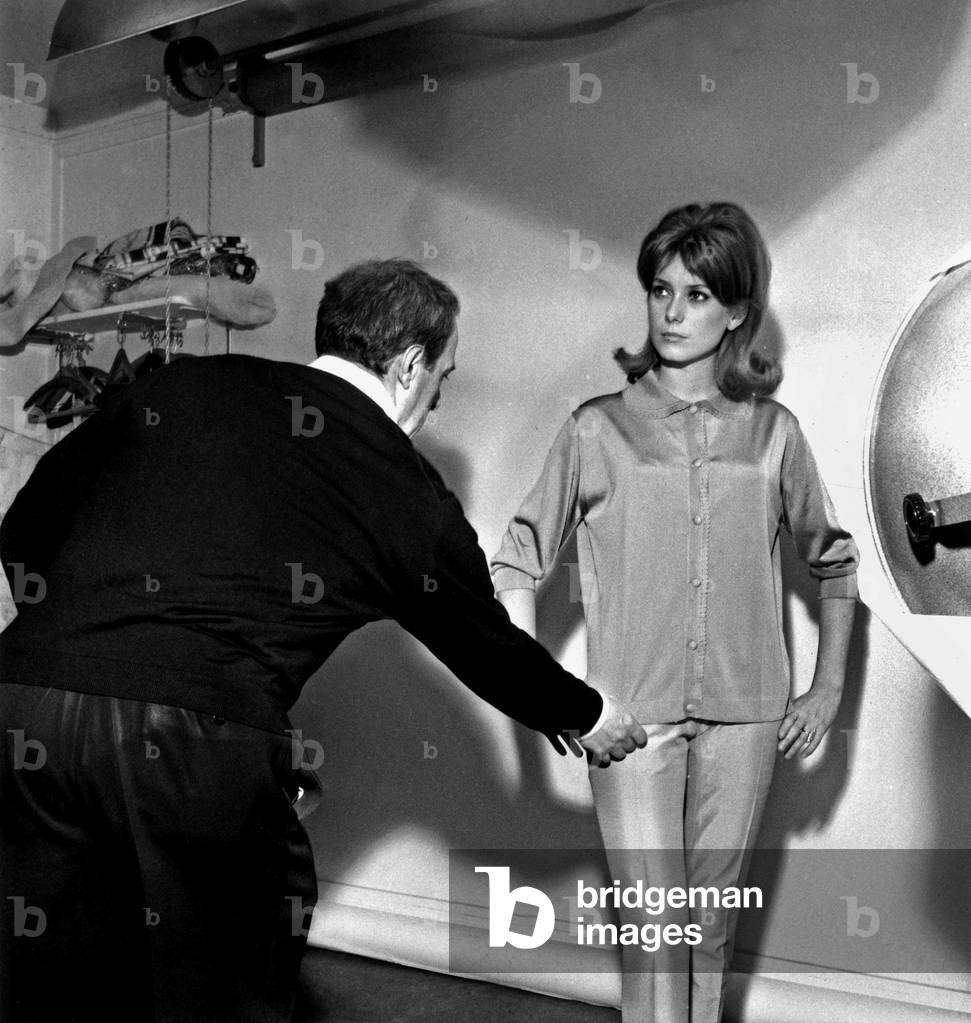 French Actress Catherine Deneuve in the shop of the Designer Jacques Esterel, 27 March 1962 (photo)