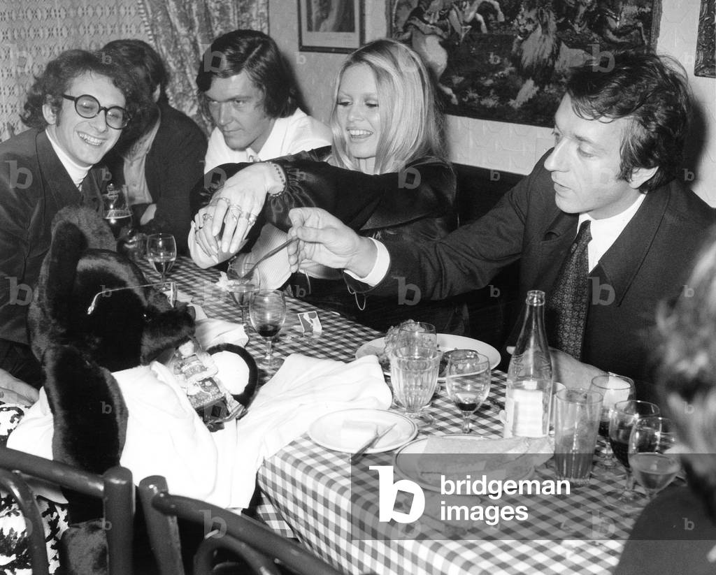 Xavier Gelin, Brigitte Bardot and Jean-Pierre Cassel at Castel's Restaurant, 1970 (photo)