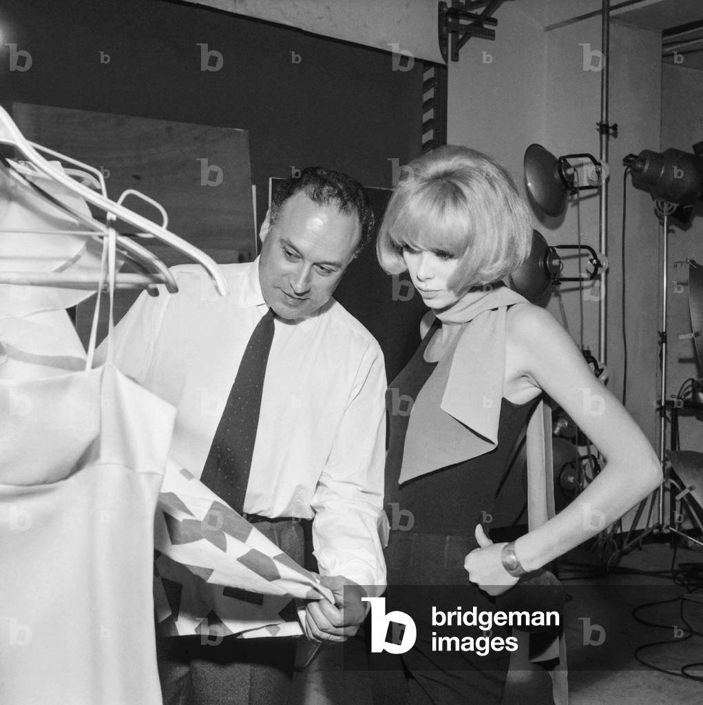 French director Pierre Gaspard Huit with actress Mireille Darc on set of film 